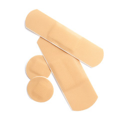 Medical sticking plasters isolated on white. First aid item