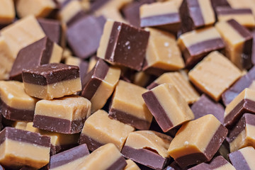 Background from handmade toffee sweets. Selective focus.