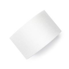 Medical sticking plaster roll isolated on white. First aid item