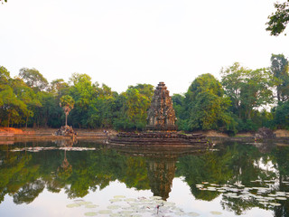 Fototapeta premium Landscape view with reflection of Neak Pean or Neak Poan in Angkor Wat complex, Siem Reap Cambodia