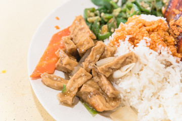 Top view traditional Chinese braised streaky belly pork, tofu and stir fry vegetables
