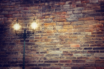 Background of old brick wall and street lantern