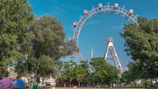 Wiener Riesenrad in Prater timelapse - oldest and biggest ferris wheel in Austria. Symbol of Vienna city. View from park
