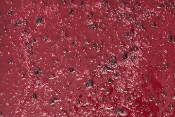 Confiture with berries. Honey with blackberries. Red color. Background, texture, close up