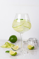 water with ice and cucumber in a glass