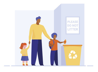 Dad with kids throwing litter in recycling bin