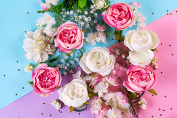 Artificial flowers background. Floral Holiday concept