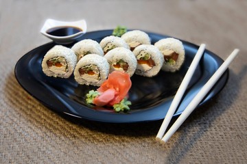 Sushi rolls closeup on burlap background
