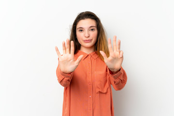Young brunette girl over isolated white background counting nine with fingers