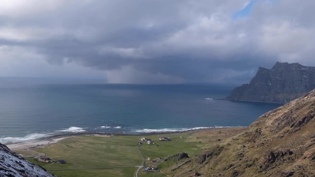 Seascape with hail storm over the sea. Aerial tilt up