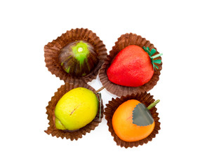 Fresh marzipan fruits isolated on a white background
