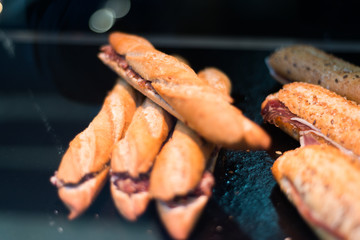 Iberian ham sandwiches seen through a shop window