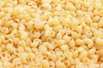 Raw pasta ingredient for traditional italian food as texture background.Copy Space