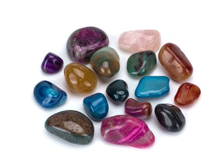 Color spectrum of semiprecious and ornamental polished stones isolated on white background