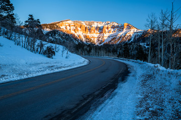 Cold winter sunset on desert tower hoodoo formations in Southern Utah.