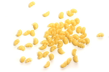 Curved raw pasta on a white isolated background