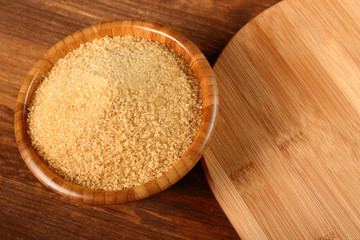 Cane Sugar in wooden bowl