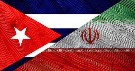 Flag of Cuba and Iran on wooden boards