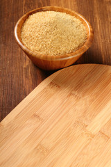 Cane Sugar in wooden bowl