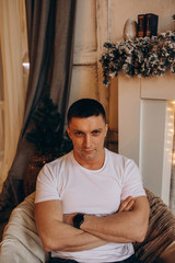 Photo session of a young guy. Classic portrait of a confident man.