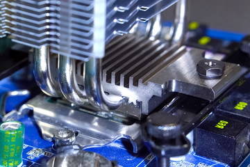 CPU cooling system. Cooler with radiator on the motherboard.