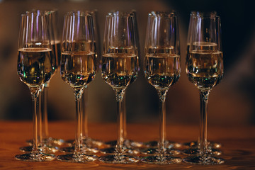 glasses of white sparkling wine champagne lot of close-ups