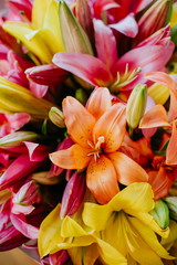 Fototapeta na wymiar bouquet bright flowers yellow red orange petals