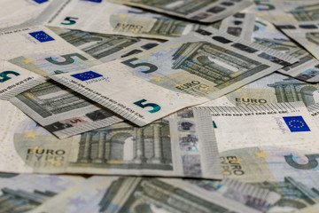 Texture with denominations of 5 euros, euro European currency.