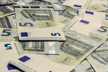 Texture with denominations of 5 euros, euro European currency.