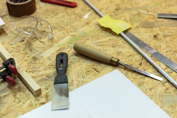 set of carpenters tool on tne wood and shavings
