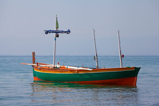 Fisherman empty barge floating in the sea