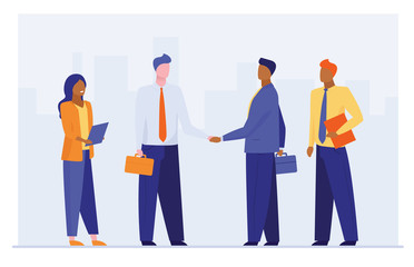 Business leaders shaking hands