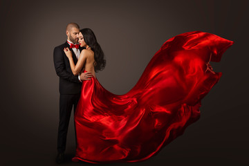 Couple Beauty Portrait, Beautiful Woman Dancing in Red Dress and Elegant Man, Cloth Fluttering on...