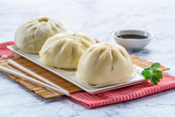 Chinese steamed buns with meat and vegetables