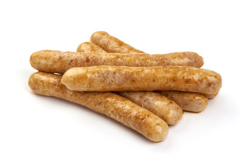 Grilled barbecue chicken sausages, isolated on white background