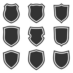 Shield shape icons set. Gray label signs. Symbol of protection