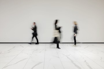 People out of focus at the airport