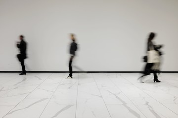 People out of focus at the airport