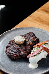 Steak and potatoes at a restaurant