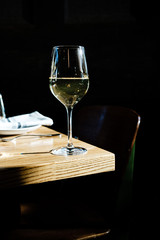 Glass of white wine on a. table