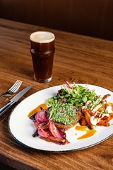 Dinner meal at a restaurant with beer
