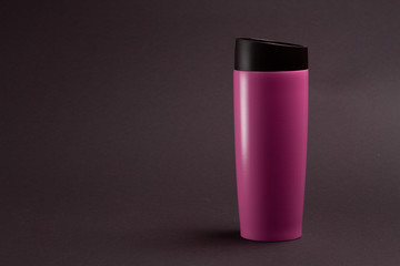 one pink thermal bottle shaker for sports nutrition on a black background.