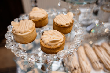 Delisious snack on the luxury glass tray decorated with crystals