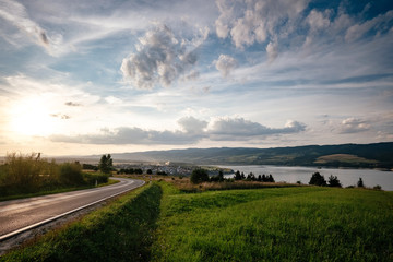 Road in mountain valley at sunny morning in Poland.