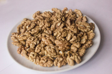  Walnuts in a white plate
