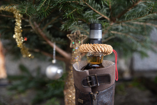 Christmas Tree With A Bottle Of Whisky In A Shoe