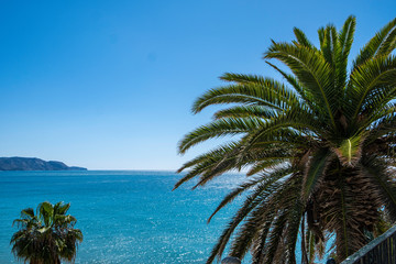 Fototapeta na wymiar blue sea and rocks in sunny day, Spain