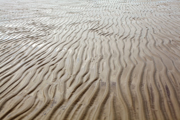 sand waves on the sand from the sea