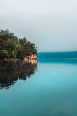 Lake Bohinj in misty august morning