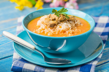 Tomato soup with rice.